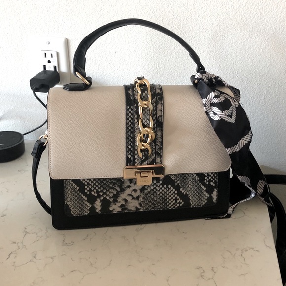 Aldo Handbags - Aldo Black & Snake Print Purse *used once*
